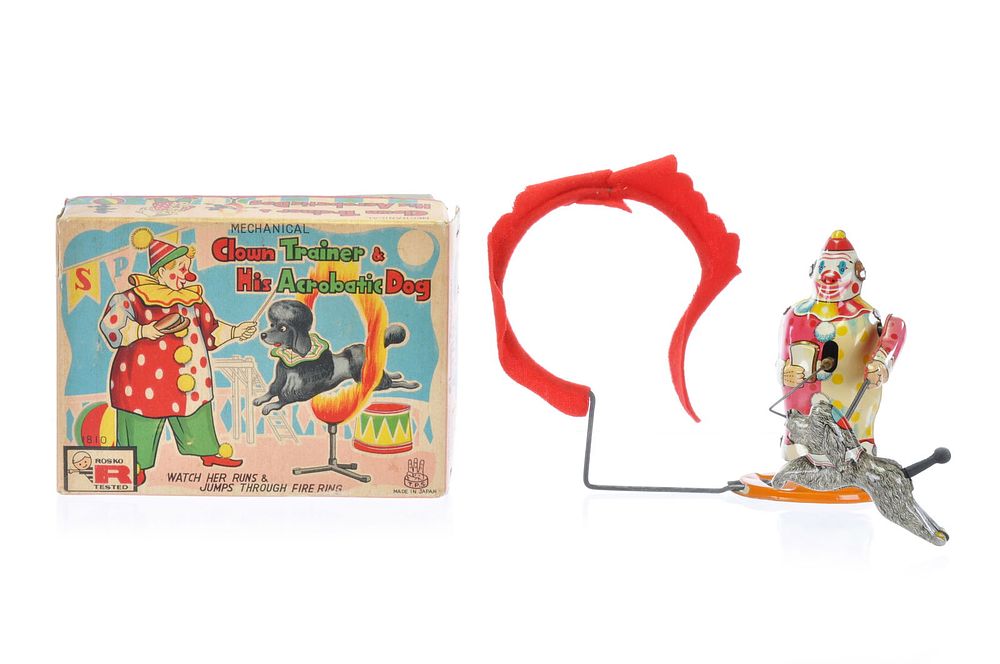 Lot 507: Rosco and TPS Clown Trainer and Dog Tin Windup