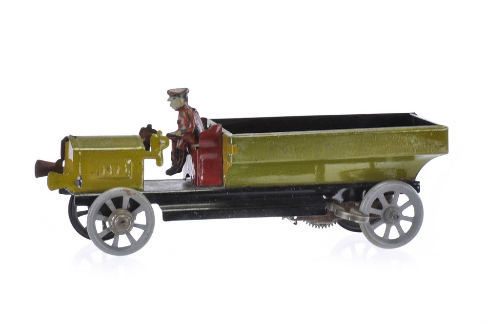 Lot 527: Early J. Distler Tin Windup Truck with Windup and Rider