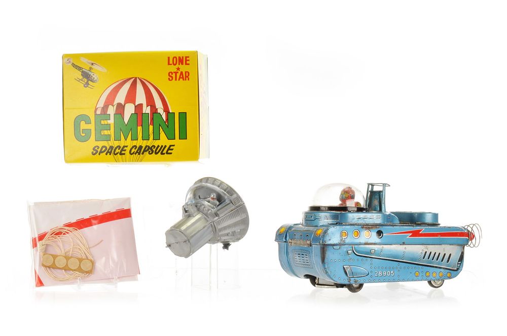 Lot 573: Boxed Gemini Space Capsule Space Toy by Lone Star and Tin Vehicle