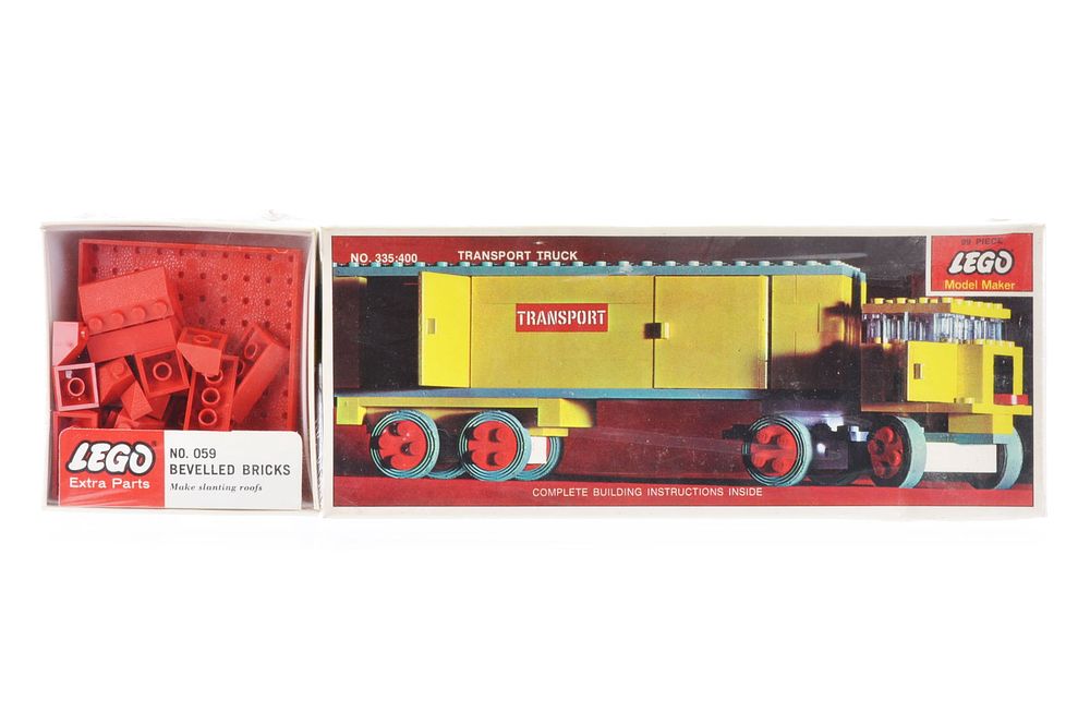 Lot 601: New Old Stock Sealed Lego Transport No. 335-400 with 059 Bevelled Bricks