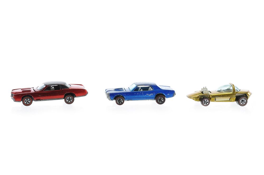 Lot 622: Magenta Custom Eldorado, Brown Interior, Blue Cougar, and Silhouette