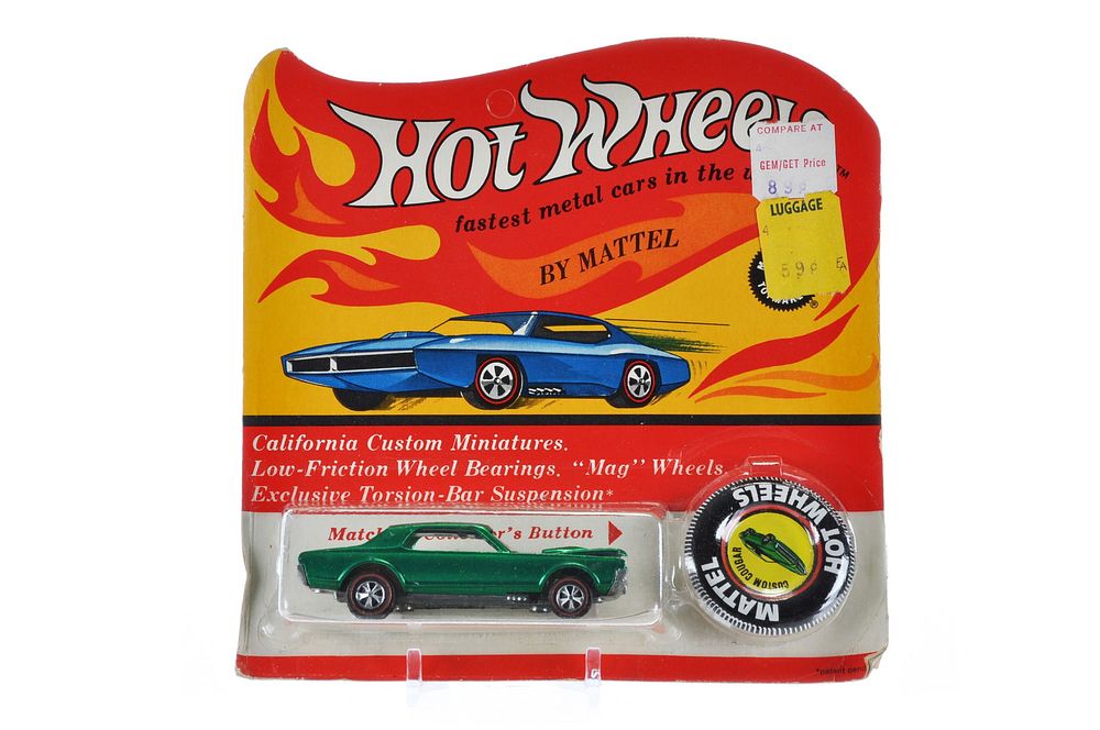 Lot 628: Custom Cougar Green Redline Hotwheels with U.S. White Interior