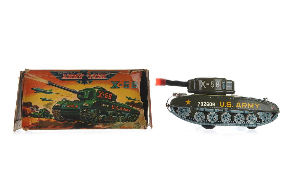 Lot 557: X-58 U.S. Battery Operated Tin Toy Tank