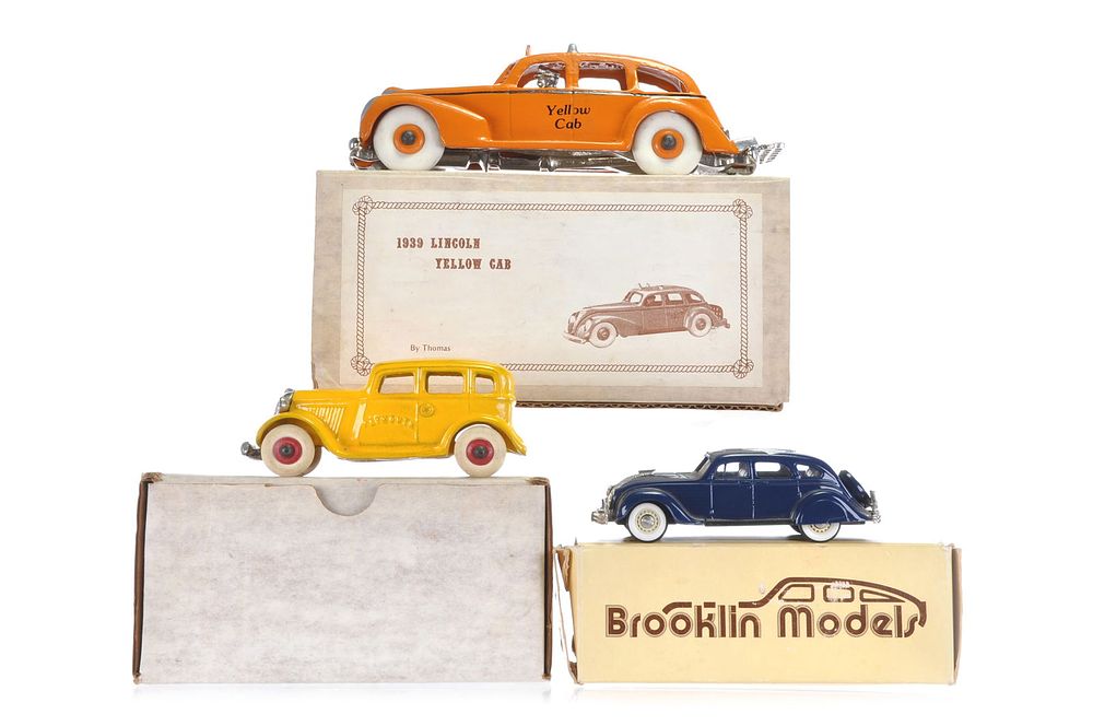 Lot 615: Thomas Toys 1939 Lincoln Cab, Plymouth, and Brooklin Airflow Boxed