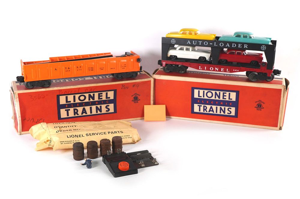 Lot 762: Lionel Automobile Car 6414 and Operating Barrel Car 3562-75 Boxed
