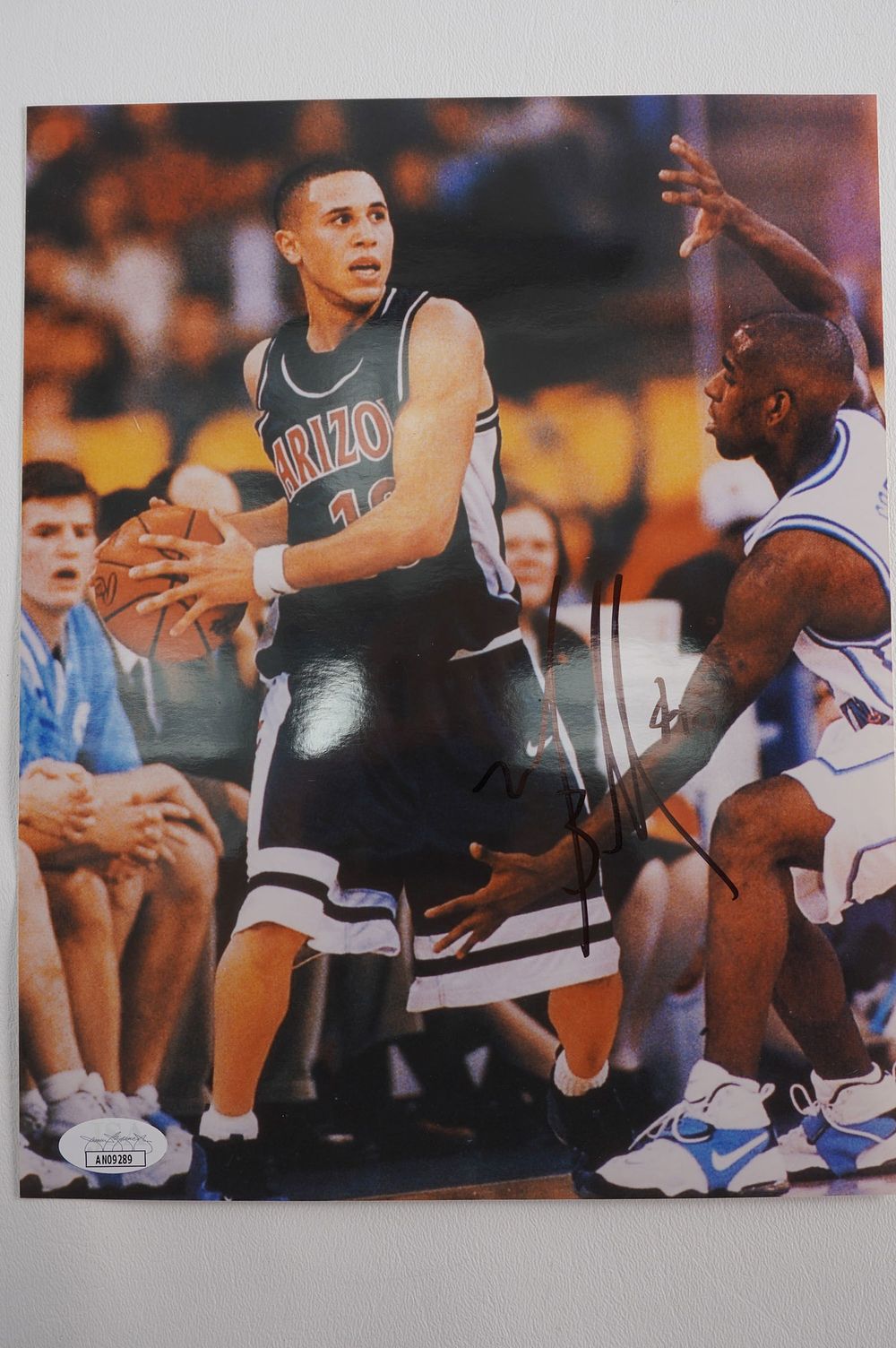Lot 155: Mike Bibby No. 10 AUTOGRAPHED 8 x 10 Color Photo Arizona Wildcats w/COA