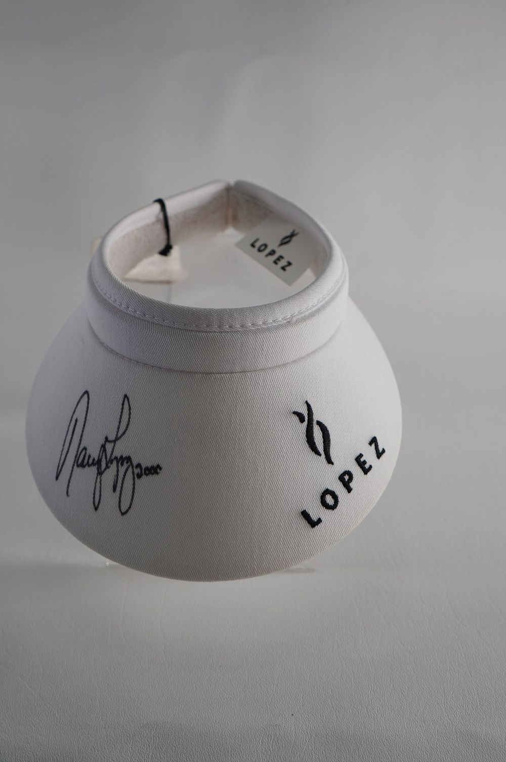 Lot 190: Nancy Lopez AUTOGRAPHED Visor w/COA
