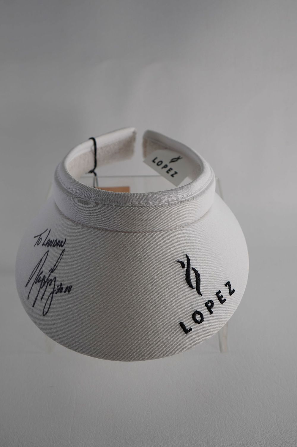 Lot 191: Nancy Lopez AUTOGRAPHED Visor w/COA
