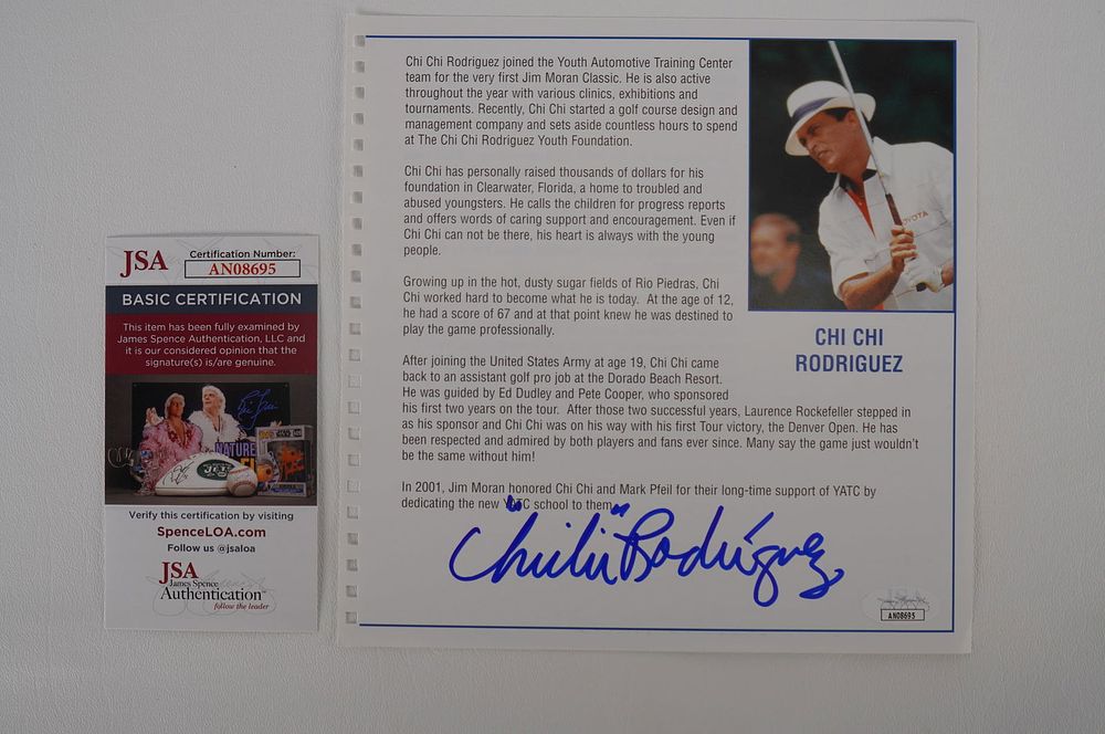 Lot 268: Chi Chi Rodriguez AUTOGRAPHED Book Page w/COA