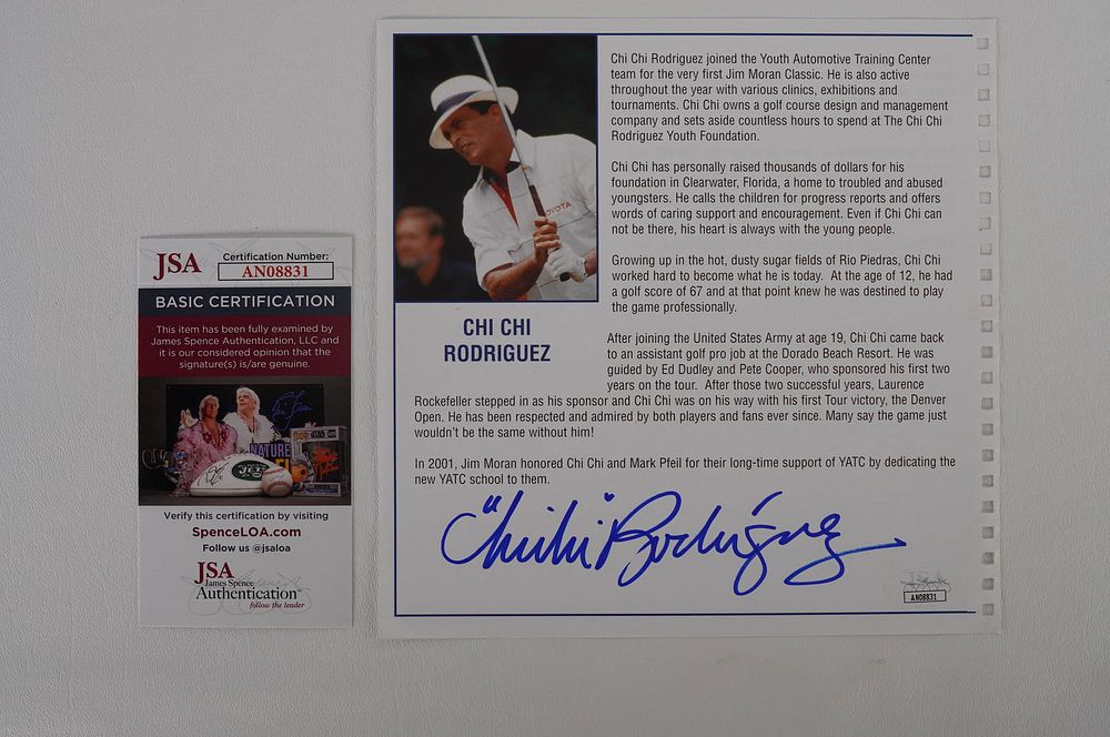 Lot 269: Chi Chi Rodriguez AUTOGRAPHED Book Page w/COA