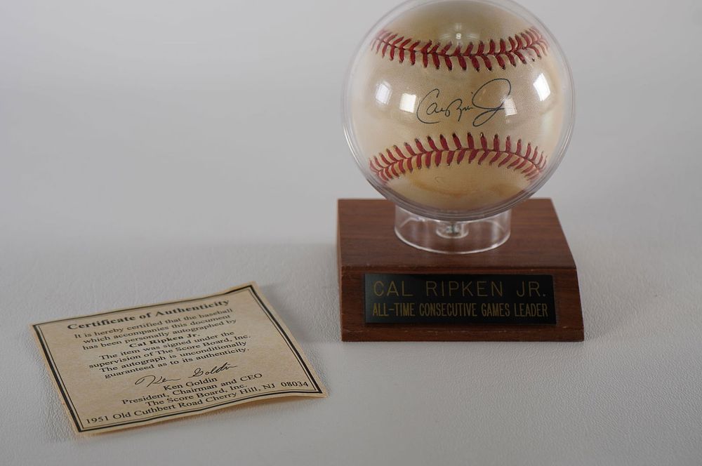 Lot 428H: Cal Ripken Jr. AUTOGRAPHED Baseball w/COA