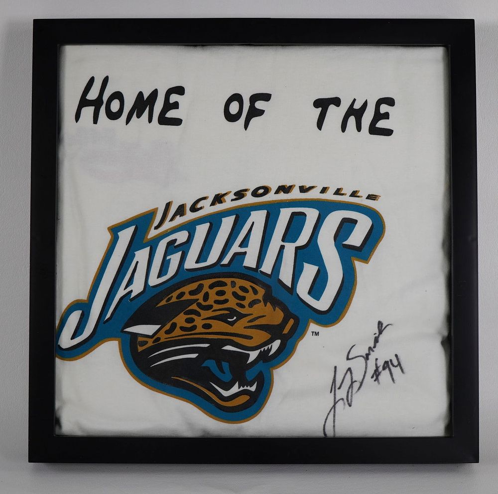 Lot 560: Larry Smith No. 94 Autographed Framed T-Shirt Jacksonville Jaguars w/COA