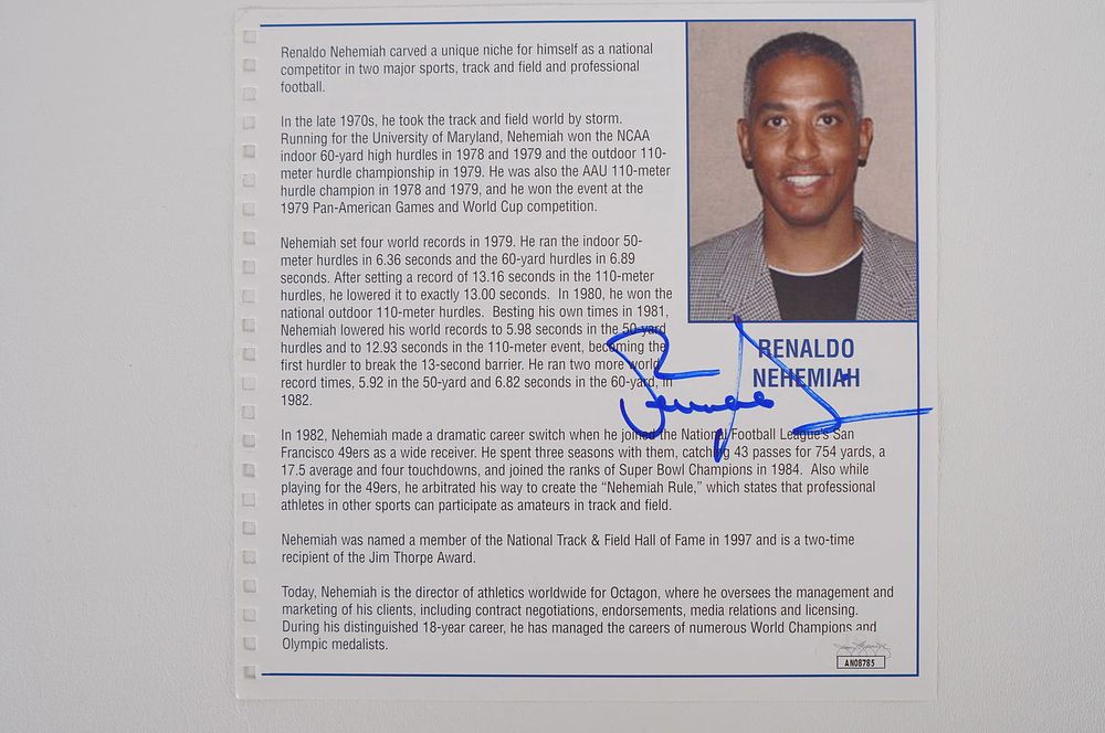 Lot 576: Renaldo Nehemiah Autographed Book Page w/COA