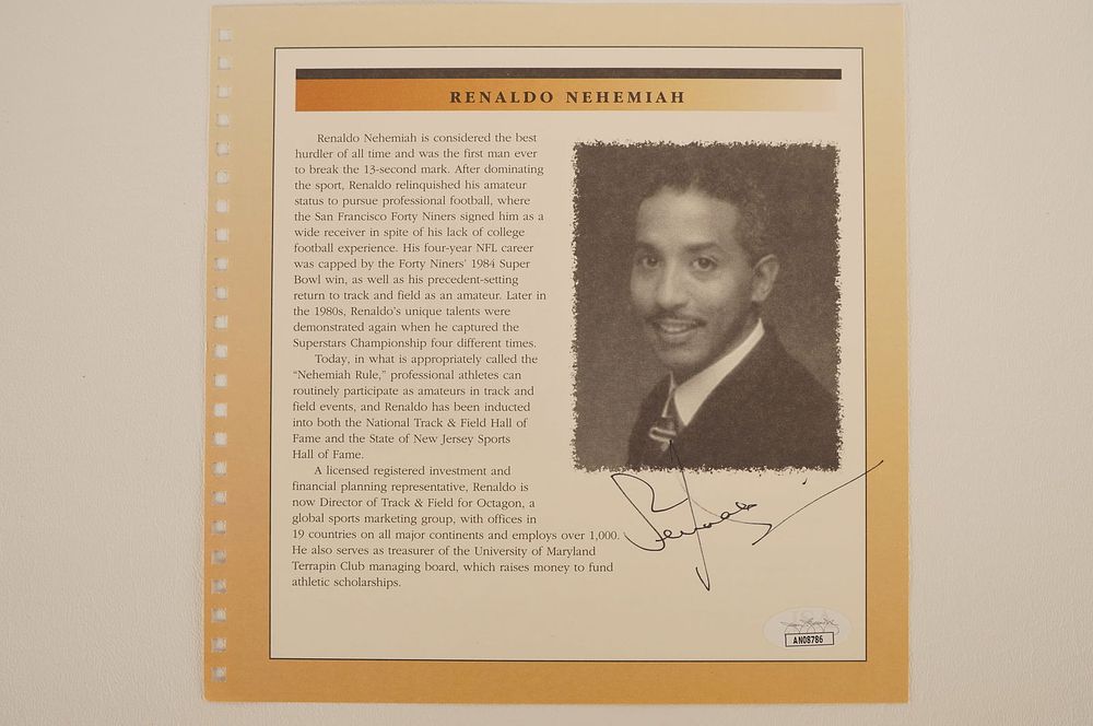 Lot 577: Renaldo Nehemiah Autographed Book Page w/COA