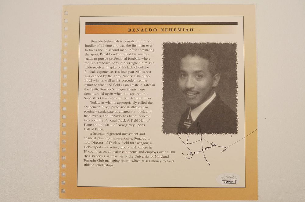 Lot 578: Renaldo Nehemiah Autographed Book Page w/COA