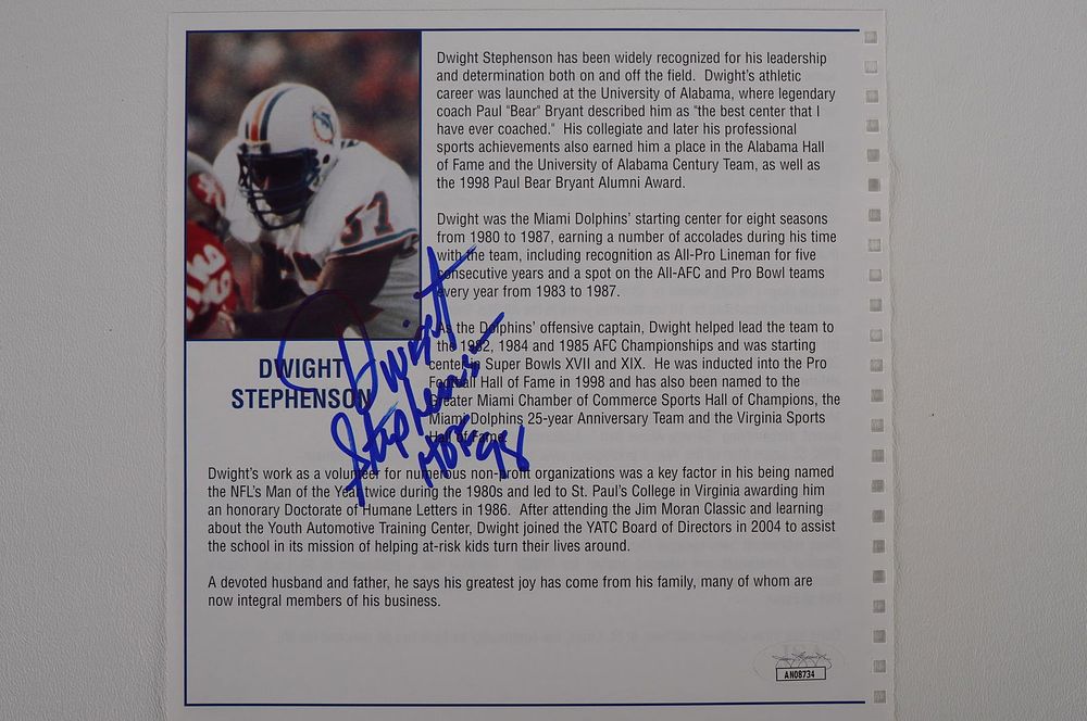 Lot 580: Dwight Stephenson No. 57 Autographed Book Page Miami Dolphins w/COA