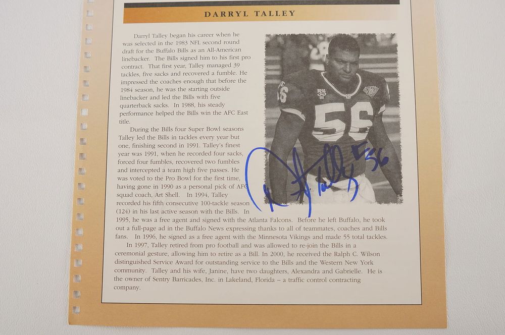 Lot 582: Darryl Talley No. 56 Autographed Book Page Buffalo Bills w/COA