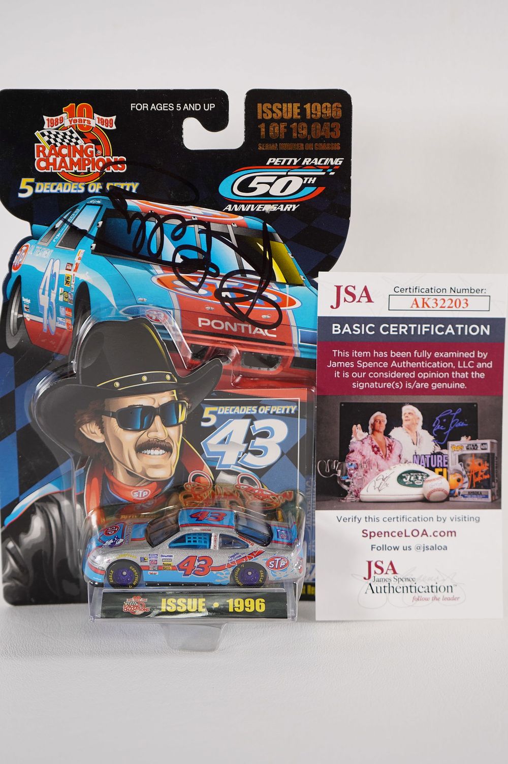 Lot 633: Richard Petty No. 43 AUTOGRAPHED Toy Car w/COA