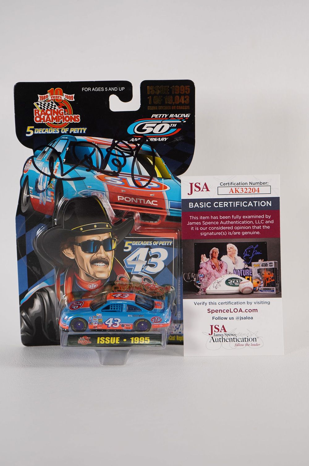 Lot 634: Richard Petty No. 43 AUTOGRAPHED Toy Car w/COA
