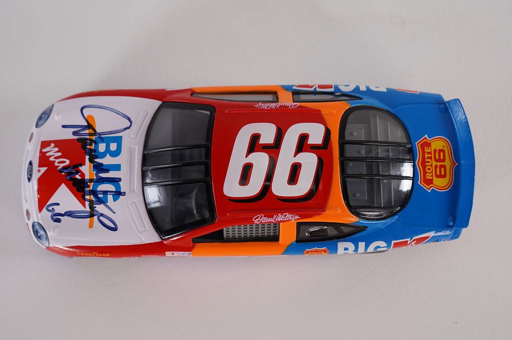 Lot 643: Darrell Waltrip No. 66 AUTOGRAPHED Toy Car w/COA