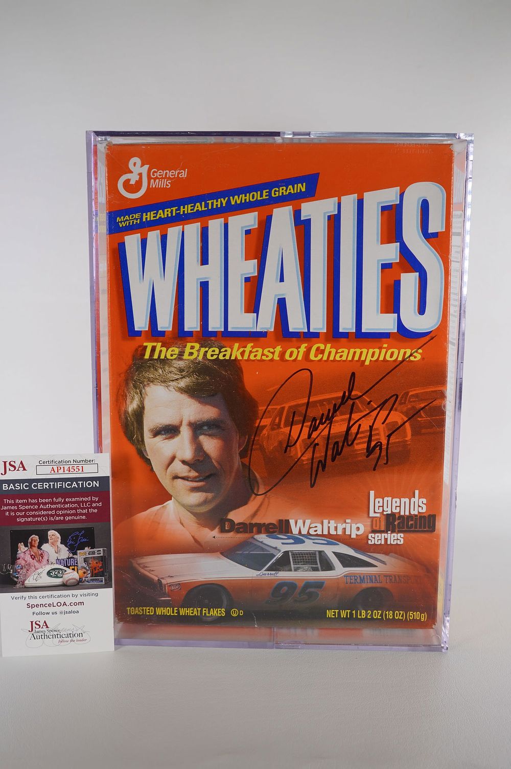 Lot 644: Darrell Waltrip No. 95 AUTOGRAPHED Cereal Box, In Case w/COA