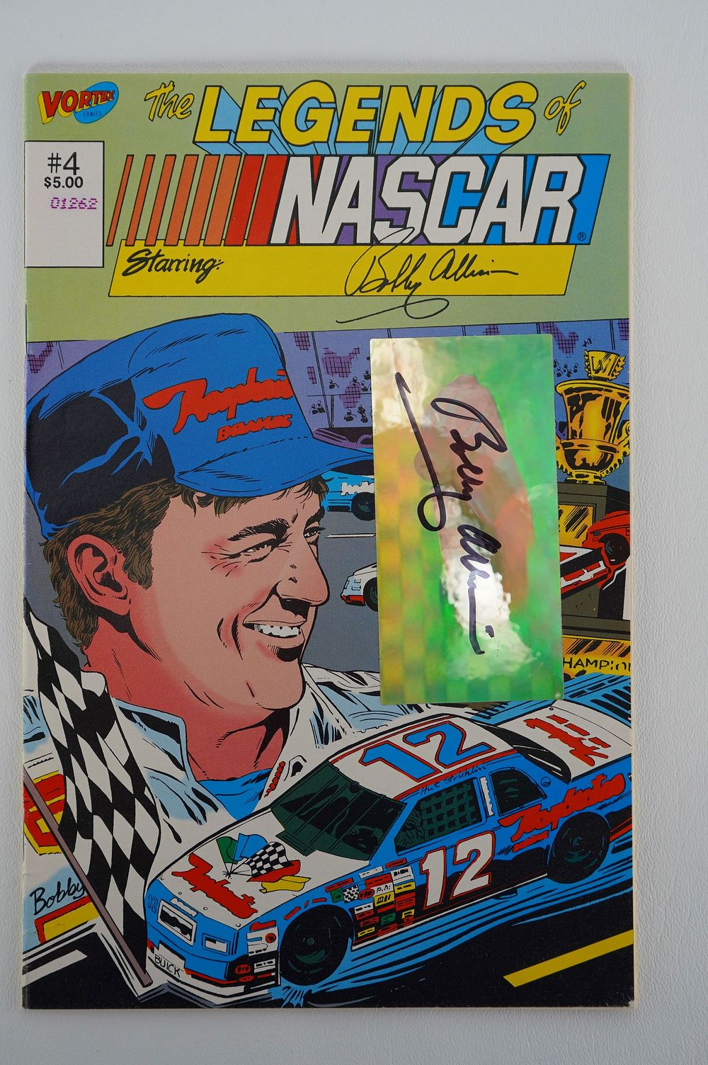 Lot 685: Bobby Allison No. 12 AUTOGRAPHED Comic Book w/COA