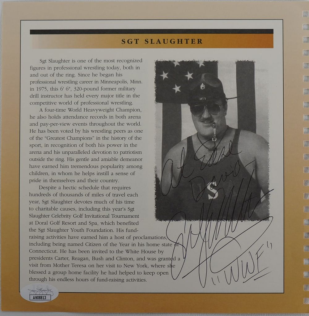 Lot 745: Sgt. Slaughter AUTOGRAPHED Book Page w/COA
