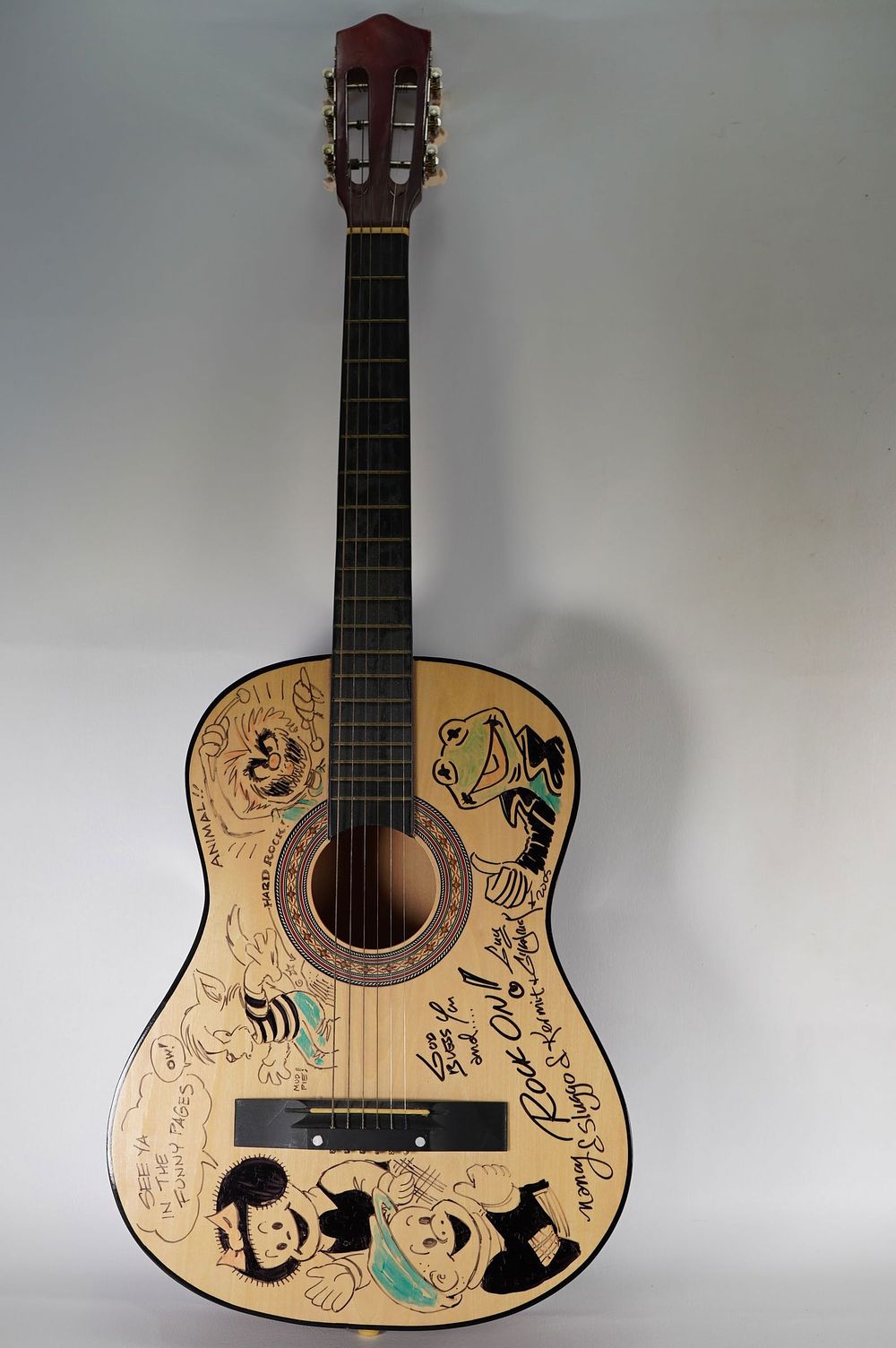 Lot 757: Guy Gilchrist, Cartoonist AUTOGRAPHED Custom Guitar Signed by Guy Gilchrist