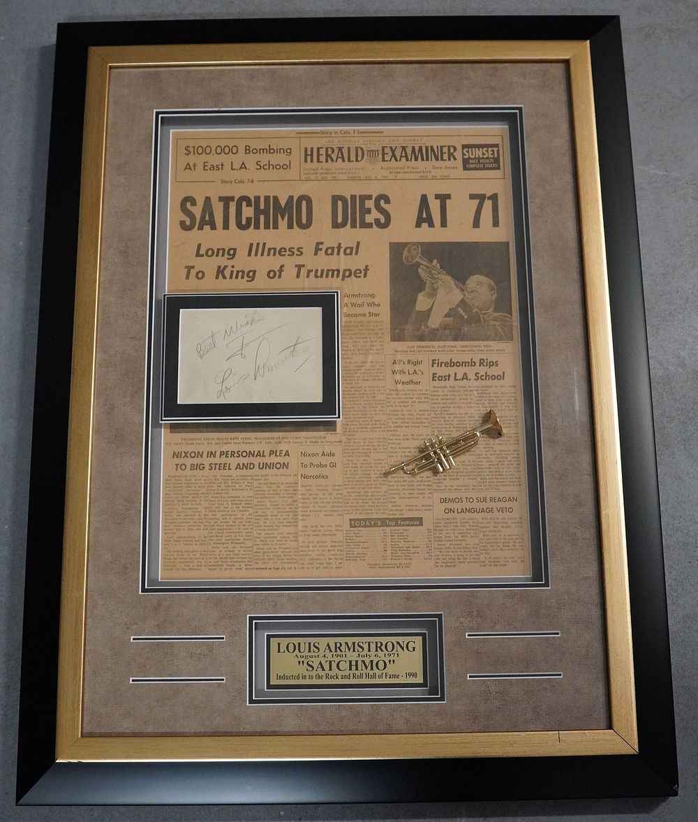 Lot 834: Louis Armstrong AUTOGRAPHED Framed Black and White Newsprint Display w/COA
