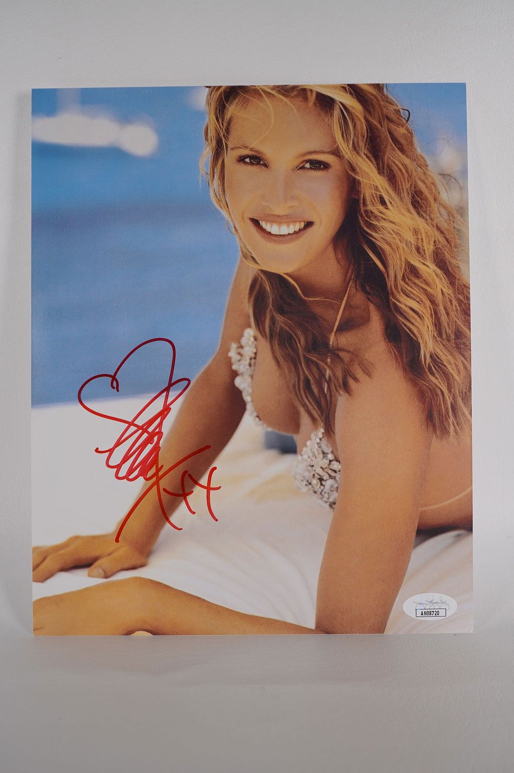 Lot 883: Elle Macpherson, Supermodel AUTOGRAPHED 8 x 10 Color Photo w/COA