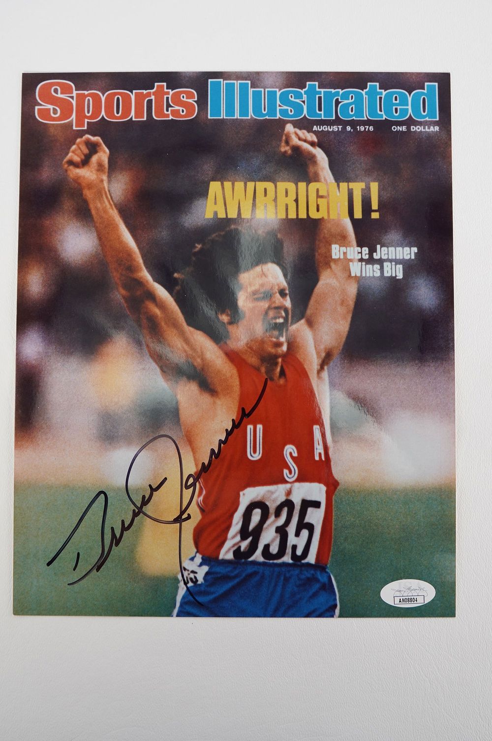 Lot 941: Bruce Jenner, Olympic Decathlon Winner AUTOGRAPHED Magazine w/COA