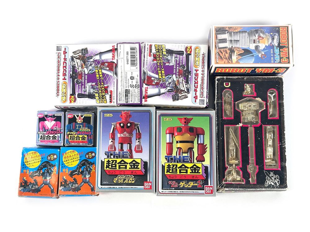 Lot 145: Lot of 10 Mini Diecast and Plastic Robots