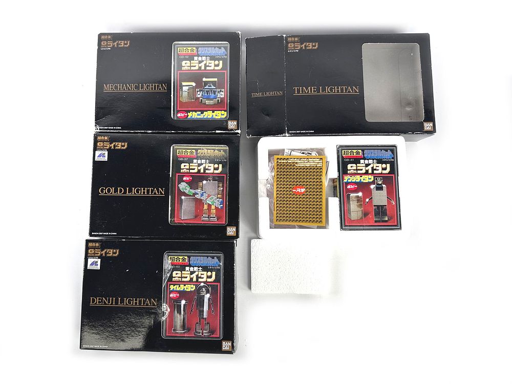 Lot 165: Gold Lightan Chogokin Lot of Four Diecast Robots