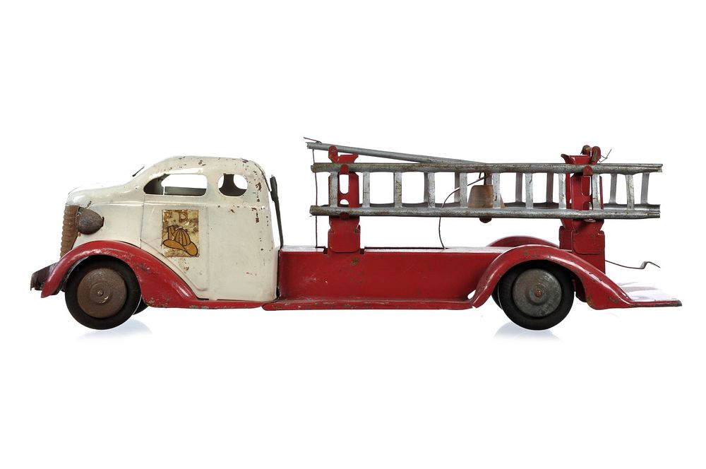 Lot 255: Turner Toys ca. 1930s Pressed Steel White and Red Fire Ladder Truck with Bell