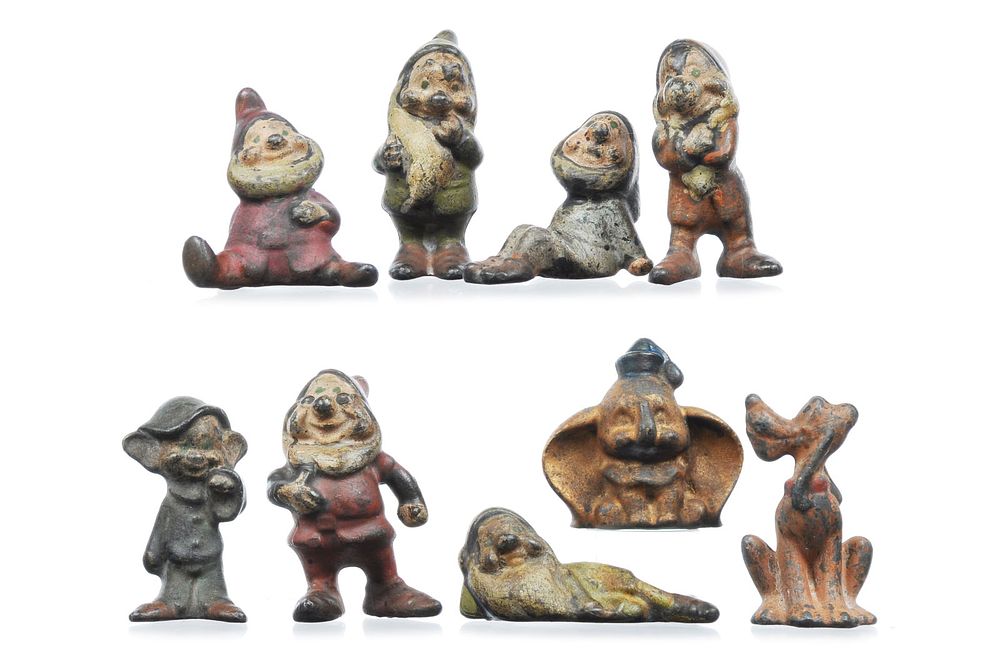 Lot 272: Vintage Disney Cast Iron Figures Snow White's Seven Dwarves, Dumbo, & Pluto