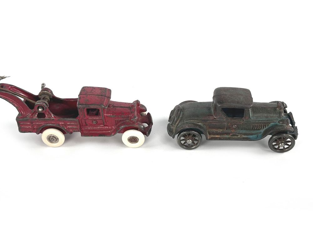 Lot 281: A.C. Williams Cast Iron Tow Truck and Rolls