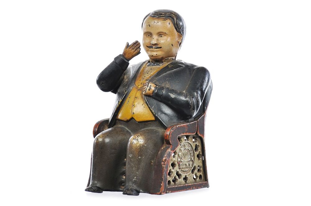 Lot 283: J & E Stevens Cast Iron No. 230 Tammany Bank “Little Fat Man" Mechanical Bank