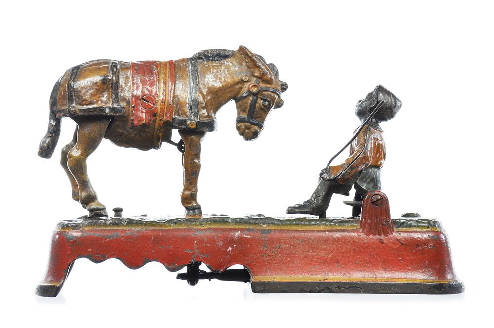 Lot 286: J & E Stevens Cast Iron No. 329 Kicking Mule Mechanical 'Spise A Mule Bank