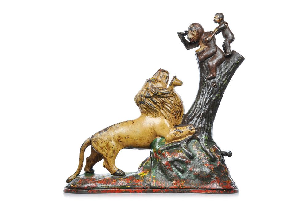 Lot 296: Kyser & Rex Cast Iron “Lion and Two Monkeys" Mechanical Bank