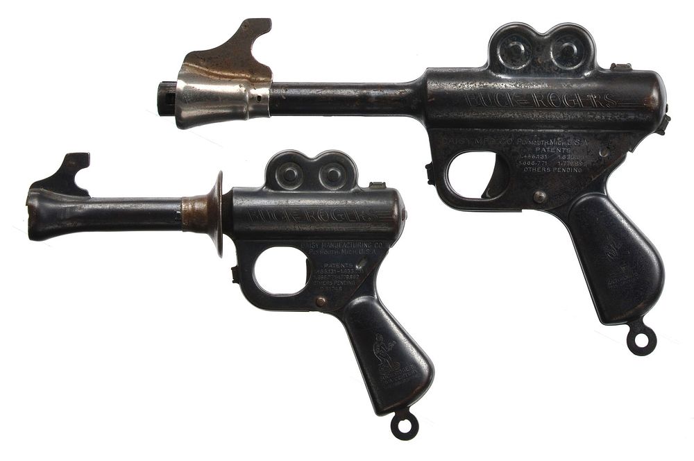Lot 388: Daisy 1930s XZ-31 and XZ35 Buck Rogers 25th Century Rocket Pistol Pop Ray Guns
