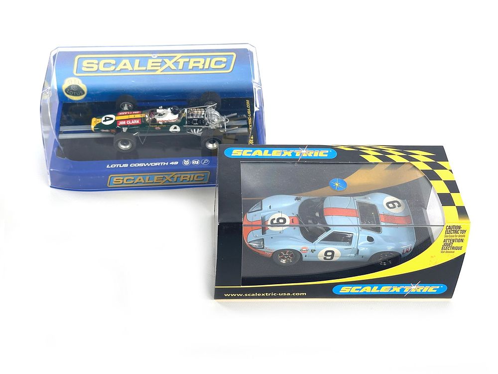 Lot 235E: Scalextric Lotus Cosworth and Ford GT-40 Gulf Slot Cars