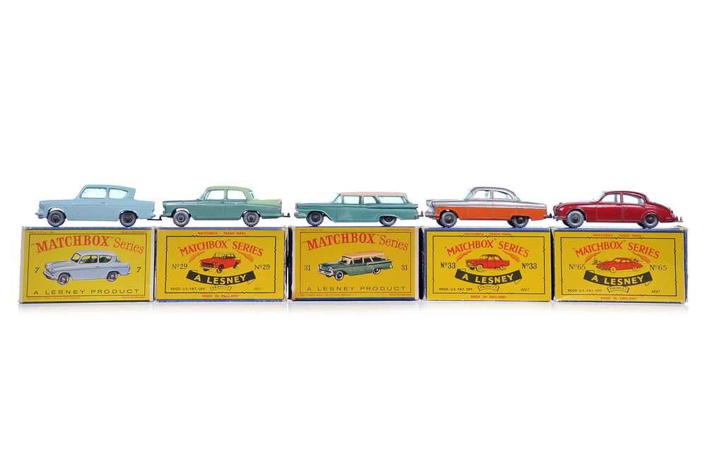Lot 380D: 5 Matchbox #7 Anglia/#29 Austin/#31 Wagon/#33 Zodiac/#65 Jaguar Boxed