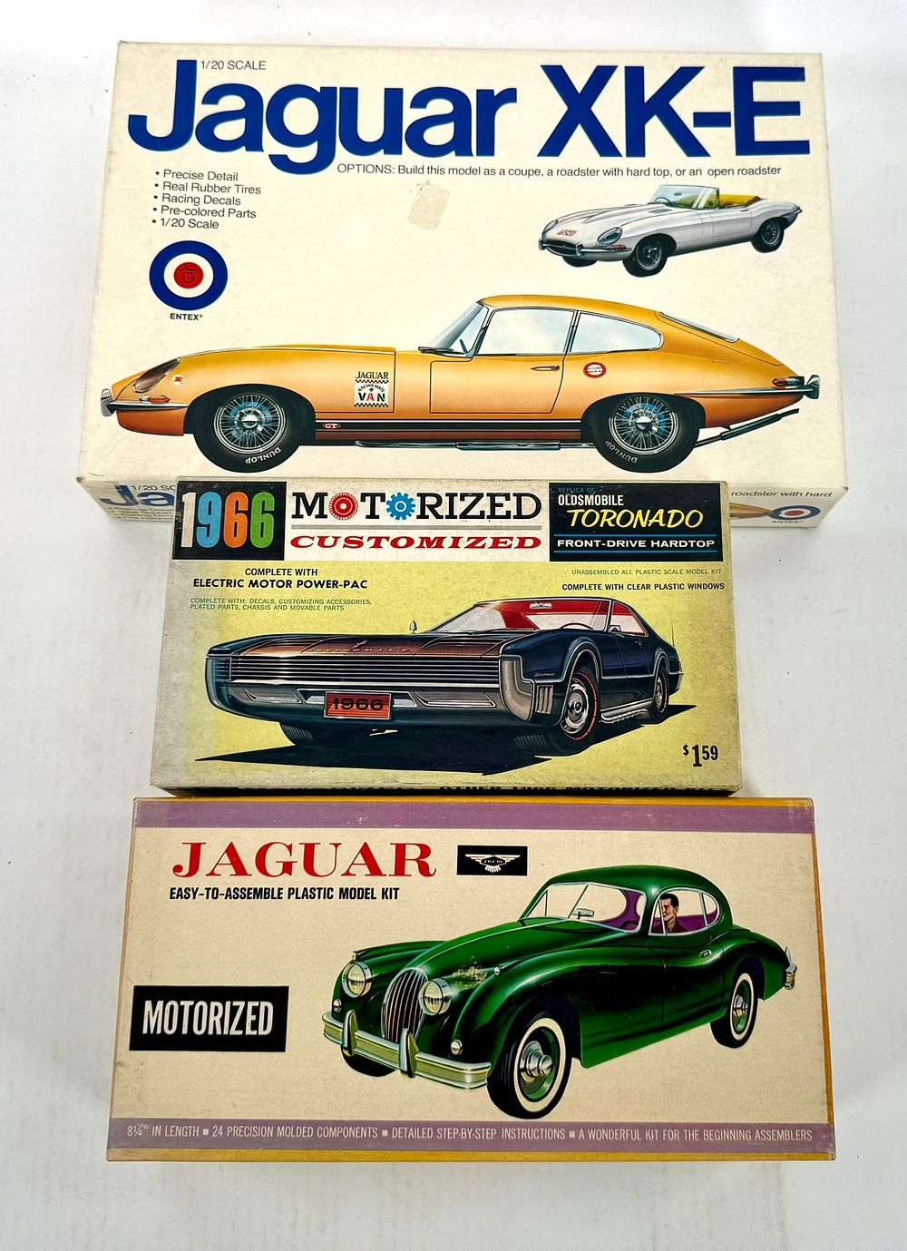 Lot 33: 3 Model Car Kits Jaguar XK-E, Oldsmobile, Jaguar MIB