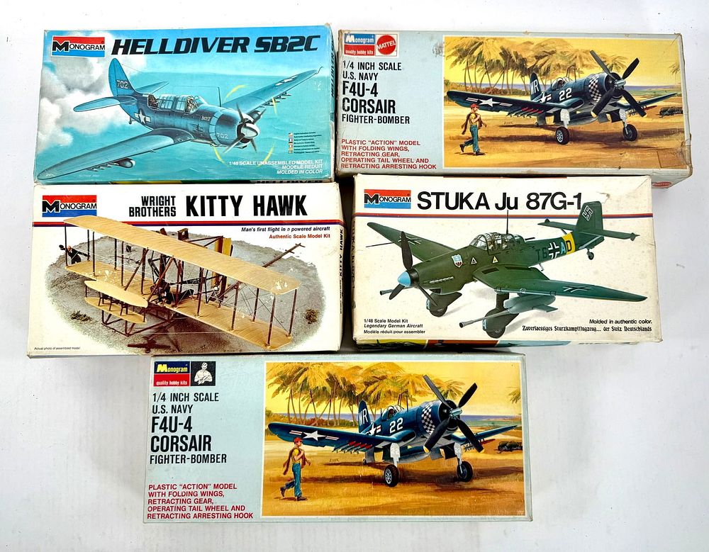 Lot 57: 5 Monogram Model Kits (2) F4U-4 Corsair Bomber/Kitty Hawk/Helldiver SB2C/Stuka Ju 87G-1