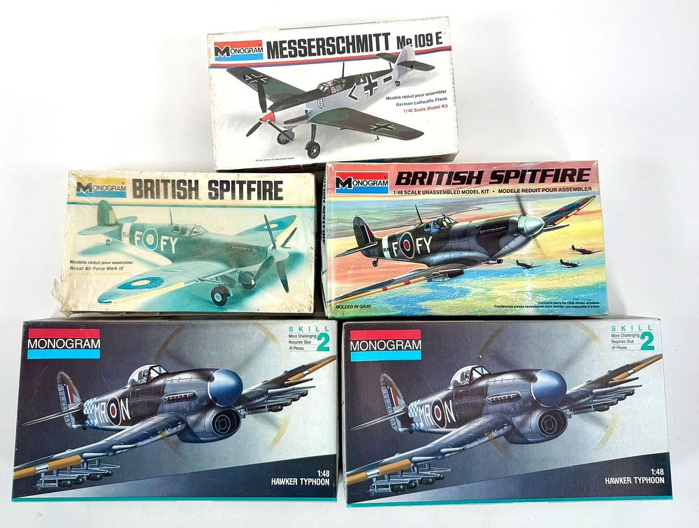 Lot 76: 5 Monogram Model Kits British Spitfire 520 & 6801/Messerschmitt Me 109E/(2) Hawker Typhoon
