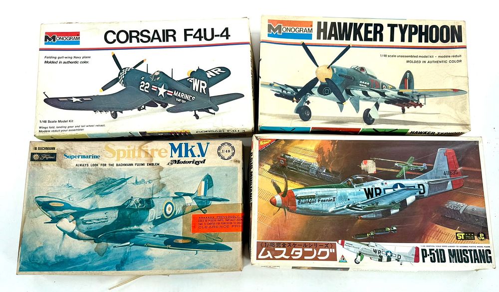 Lot 77: 4 Model Plane Kits Corsair F4U-4/Hawker Typhoon/Supermarine Spitfire MKV/Mustang P-51D