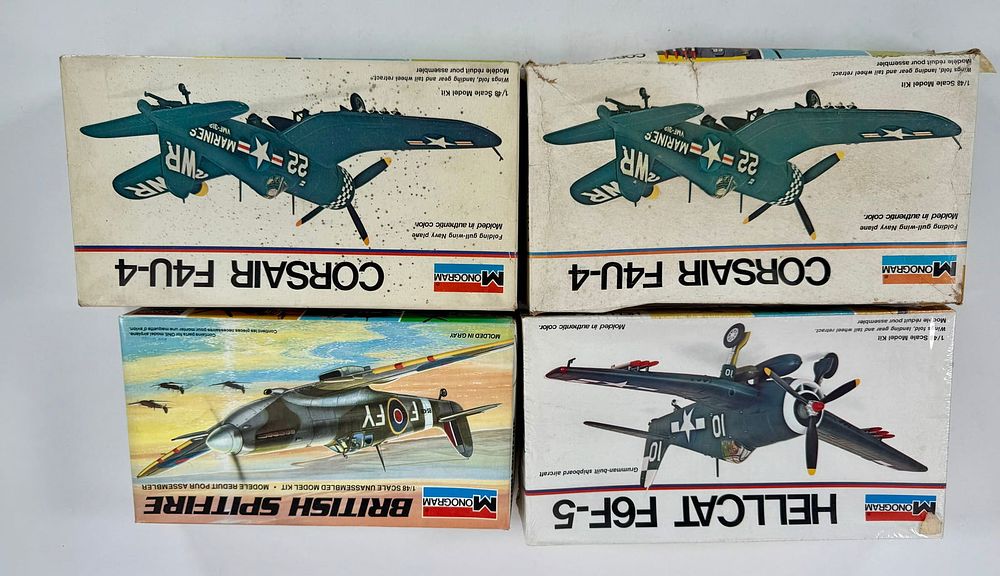 Lot 81: 4 Model Plane Kits British Spitfire/Hellcat F6F-5/(2) Corsair F4U-4