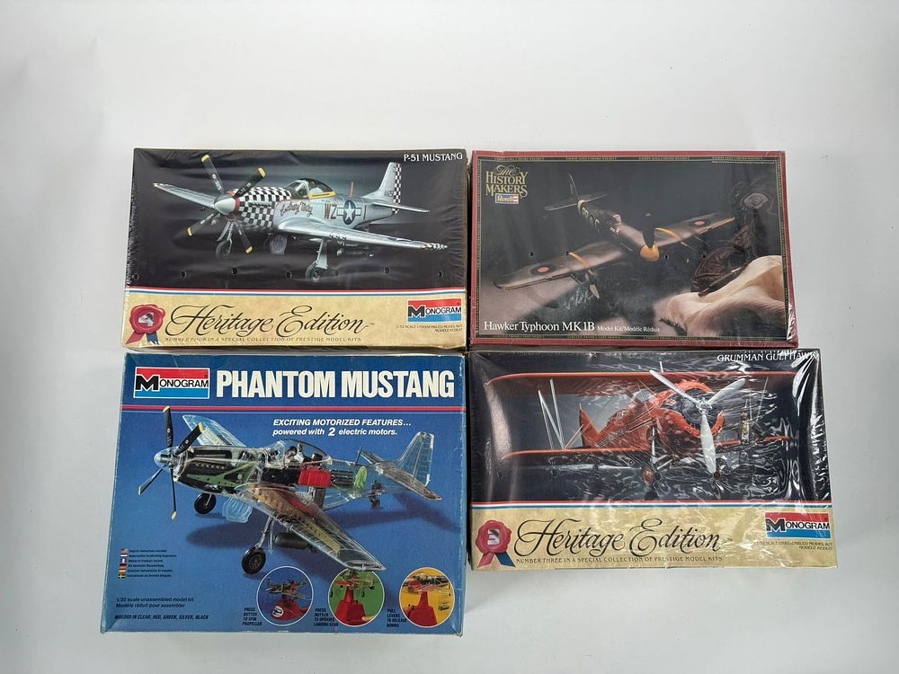 Lot 87: 4 Model Plane Kits Grumman Gulfhawk/Hawker Typhoon MK1B/P-51 Mustang/Phantom Mustang