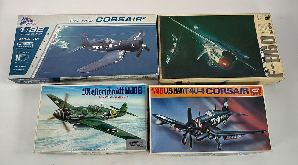 Lot 106: 4 Model Plane Kits Messerschmitt Me 109/US Navy F4U-4 Corsair/North America F86D/F4U-1A D Corsair