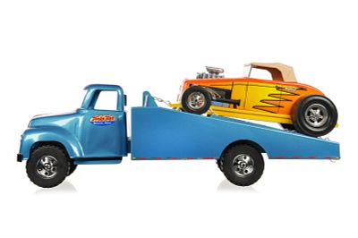 Tonka Flatbed Tow Truck w/Nylint Hot Rod. This is a Tonka flatbed tow truck with a Nylint hot 